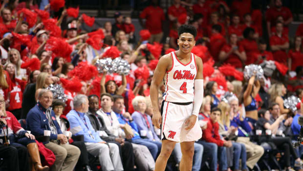 Mississippi Rebels guard Breein Tyree (4) smiles as fans cheer prior to a game against the Missouri Tigers at The Pavilion at Ole Miss. Mandatory Credit: Petre Thomas-USA TODAY Sports